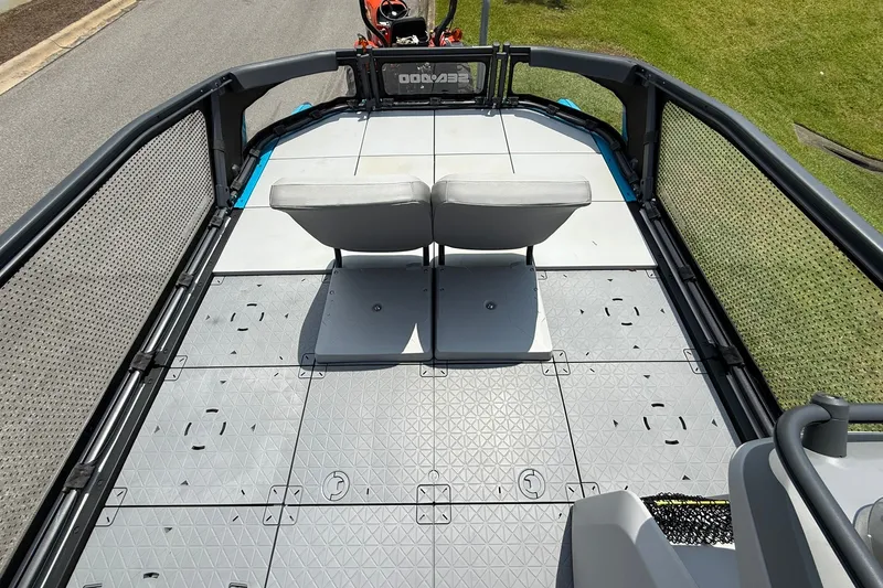 Slide: The Image of 2023 Sea-Doo Switch Sport 21 deck with seating, showcasing spacious layout and modern design. - 6