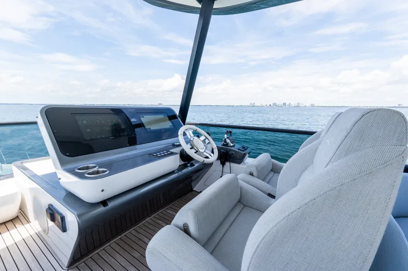 Slide: The Image of Luxurious helm of 2023 Azimut Fly 68 yacht with ocean view. - 78