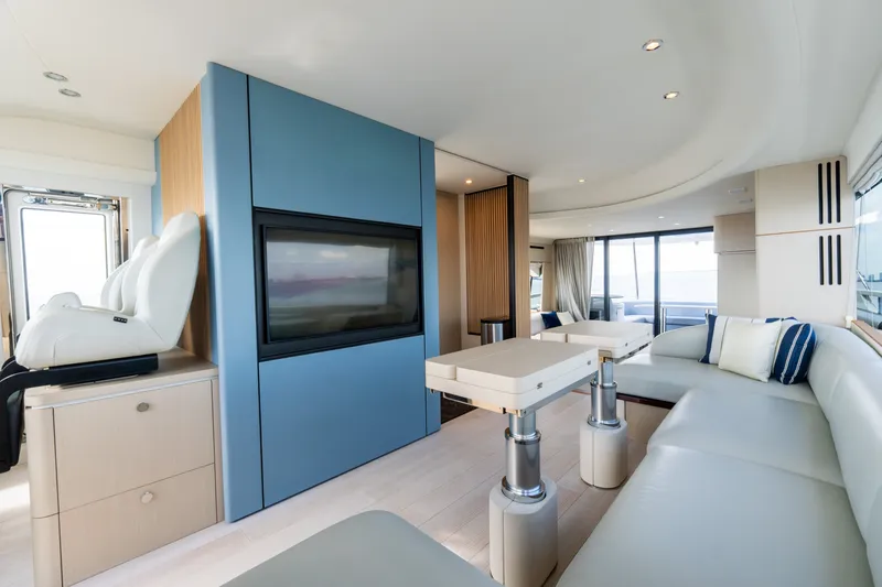 Slide: The Image of Luxurious interior of 2023 Azimut Fly 68 yacht with modern seating and elegant decor. - 65