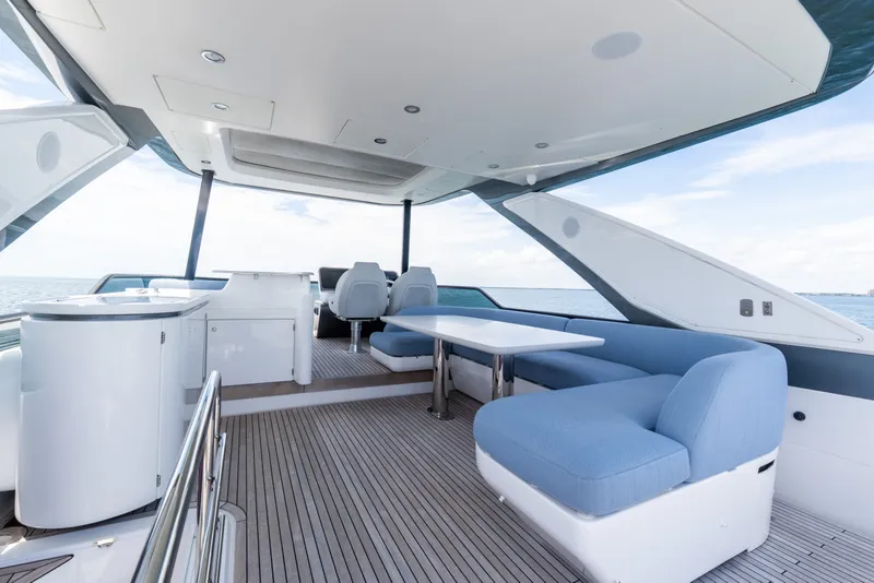 Slide: The Image of Luxurious 2023 Azimut Fly 68 yacht interior with modern seating and ocean view. - 23