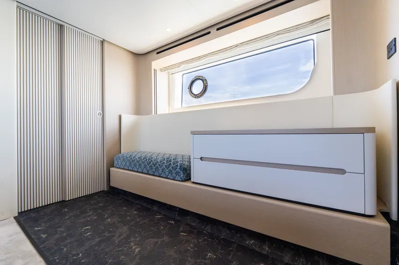Slide: The Image of Luxurious interior of 2023 Azimut Fly 68 yacht with modern design and window view. - 34