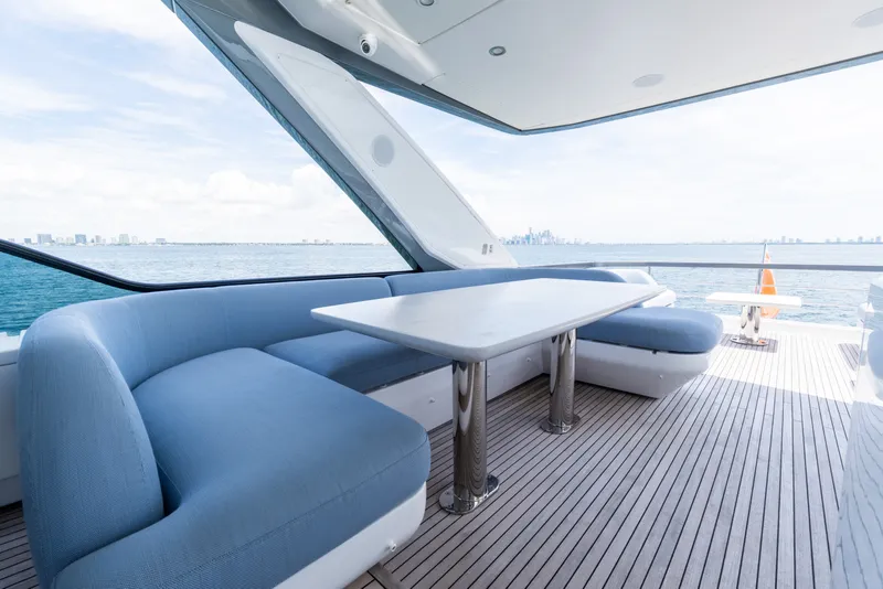 Slide: The Image of Luxurious 2023 Azimut Fly 68 yacht deck with elegant seating and ocean view. - 27