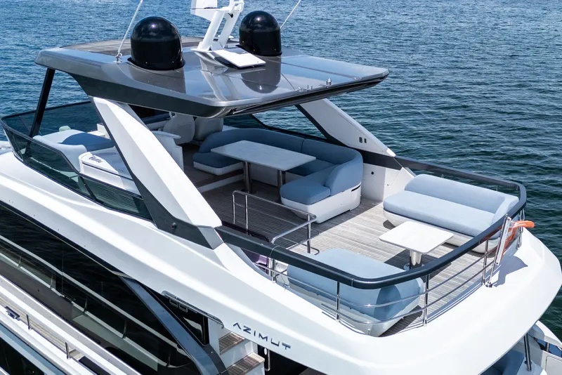 Slide: The Image of Luxurious 2023 Azimut Fly 68 yacht with spacious upper deck and elegant seating. - 93