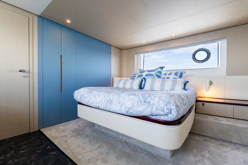 Slide: The Image of Luxurious bedroom interior of 2023 Azimut Fly 68 yacht with modern design and ocean view. - 30