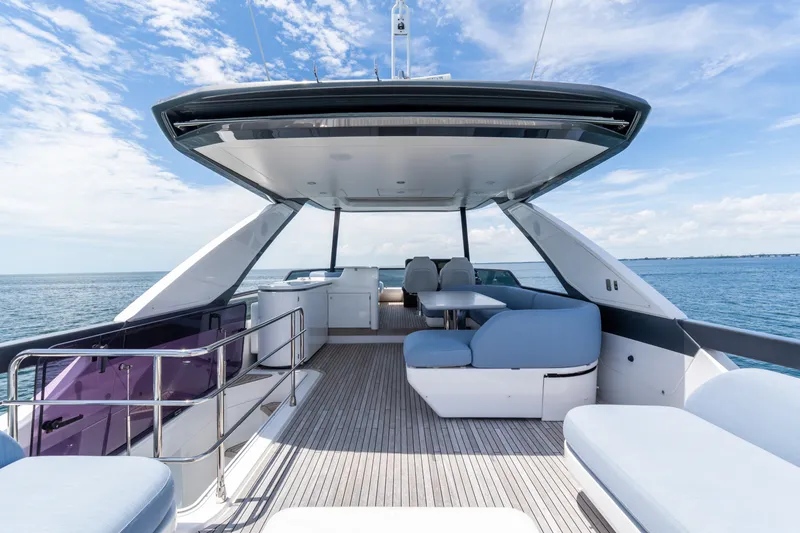 Slide: The Image of Luxurious 2023 Azimut Fly 68 yacht deck with modern seating and ocean view. - 28
