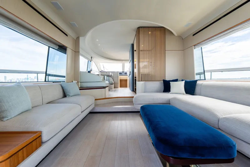 Slide: The Image of Luxurious interior of 2023 Azimut Fly 68 yacht with elegant seating and panoramic windows. - 47