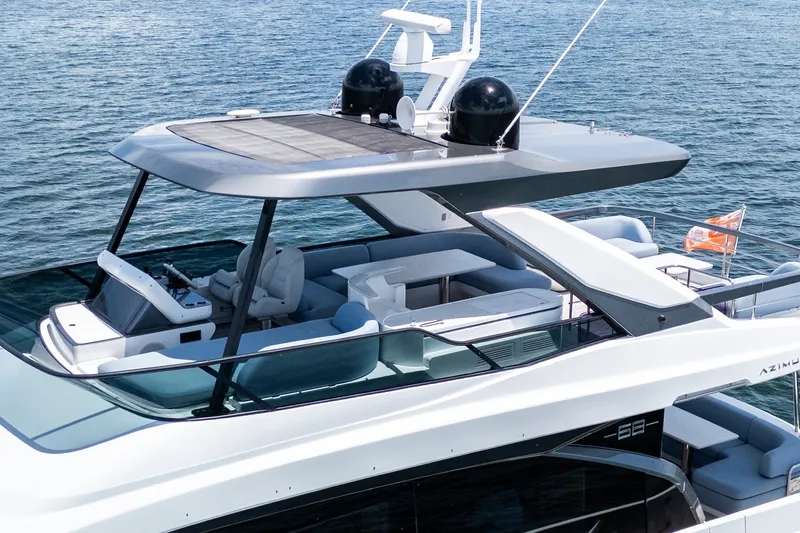 Slide: The Image of Luxury Azimut Fly 68 yacht, 2023 model, featuring sleek design and spacious upper deck. - 91