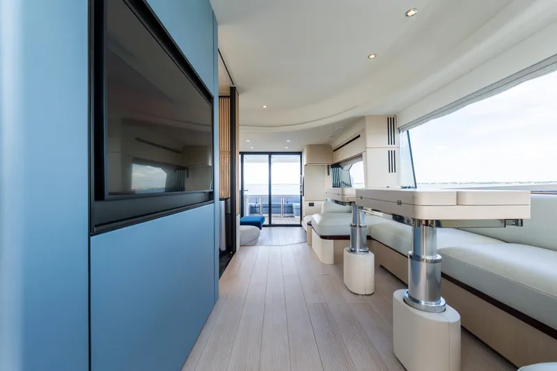 Slide: The Image of Luxurious interior of 2023 Azimut Fly 68 yacht with modern design and panoramic windows. - 64