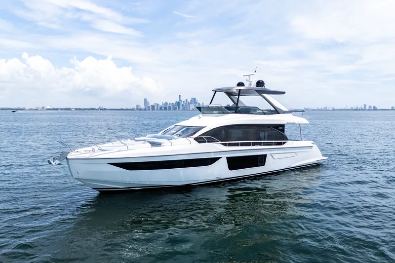 Slide: The Image of Luxury Azimut Fly 68 yacht cruising on open water, 2023 model. - 2