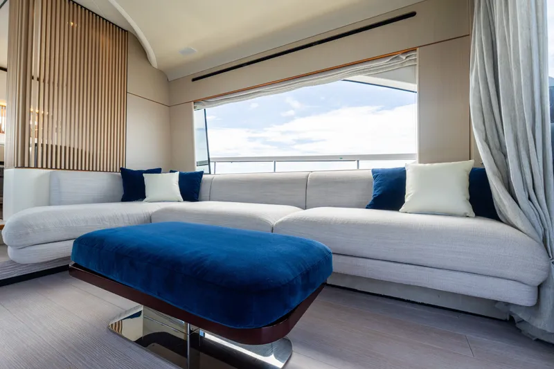 Slide: The Image of Luxurious interior of 2023 Azimut Fly 68 yacht with elegant seating and ocean view. - 49