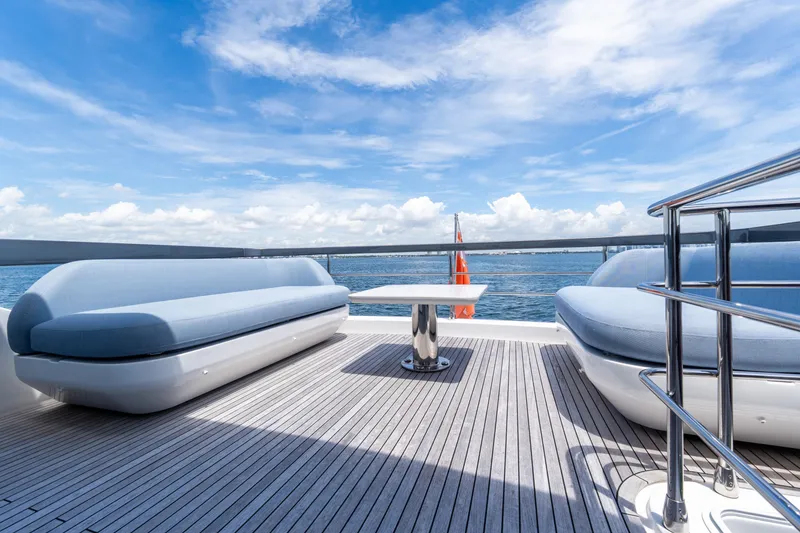 Slide: The Image of Luxurious deck of 2023 Azimut Fly 68 yacht with ocean view and seating area. - 75