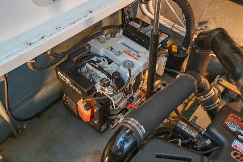 Slide: The Image of Engine compartment of a 2004 Sea Ray 340 Sundancer with Kohler power systems. - 41