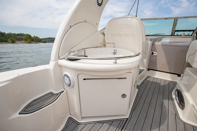 Slide: The Image of 2004 Sea Ray 340 Sundancer boat interior with sleek design and modern amenities. - 18