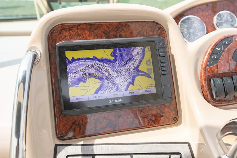 Slide: The Image of Garmin navigation system on 2004 Sea Ray 340 Sundancer boat dashboard. - 27