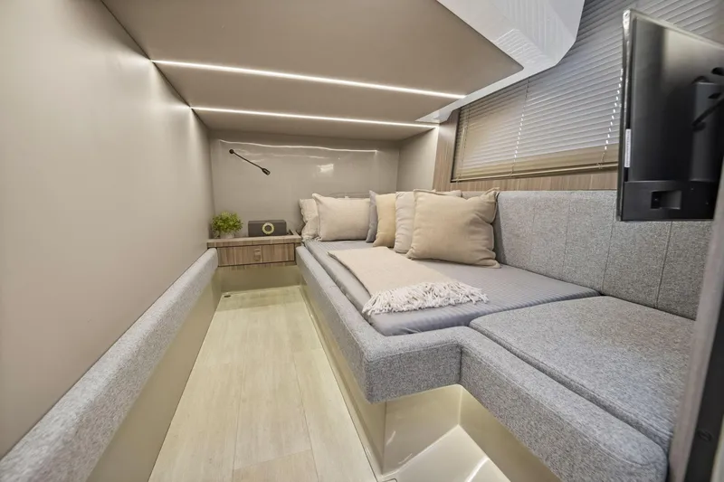 Slide: The Image of Luxurious interior of 2026 Hanover 447 with modern seating and ambient lighting. - 44