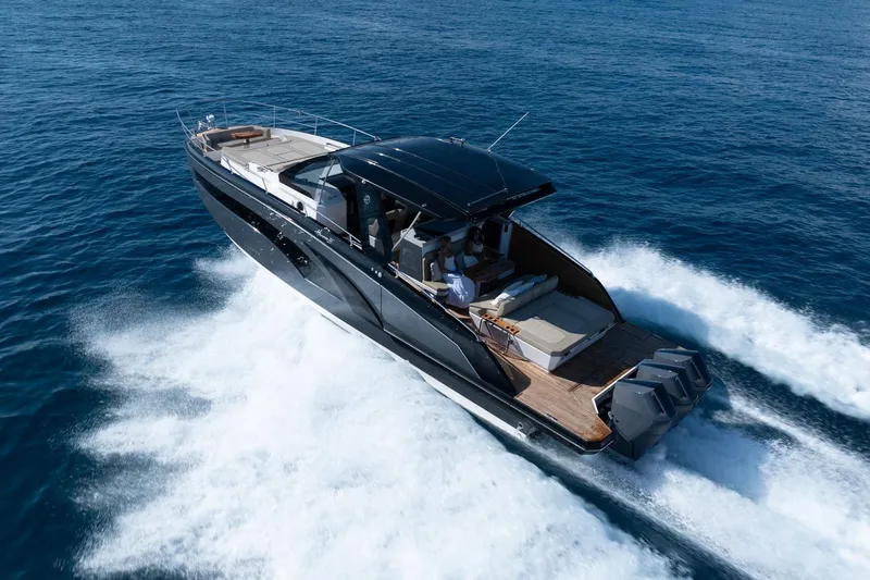 Slide: The Image of Luxurious 2026 Hanover 447 yacht cruising on open sea, showcasing sleek design and powerful engines. - 2
