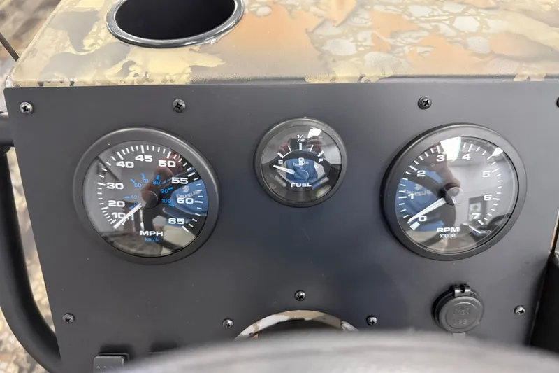 Slide: The Image of Dashboard of Thor BH1900CC 2027 with speedometer, fuel gauge, and RPM meter. - 7