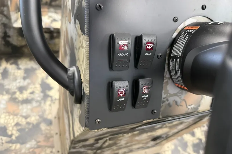 Slide: The Image of Control panel of 2027 Thor BH1900CC with navigation, bilge, and light switches. - 9