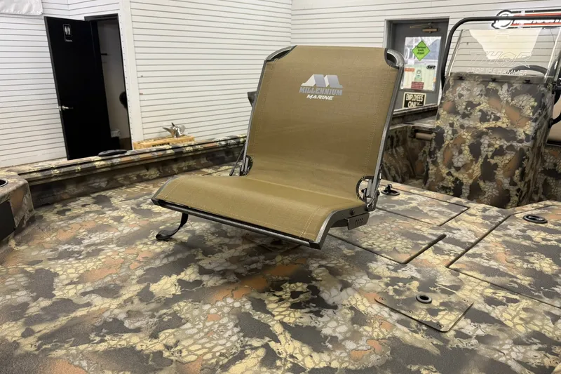 Slide: The Image of Camouflage-patterned Thor BH1900CC boat interior with Millennium Marine seat, 2027 model. - 16