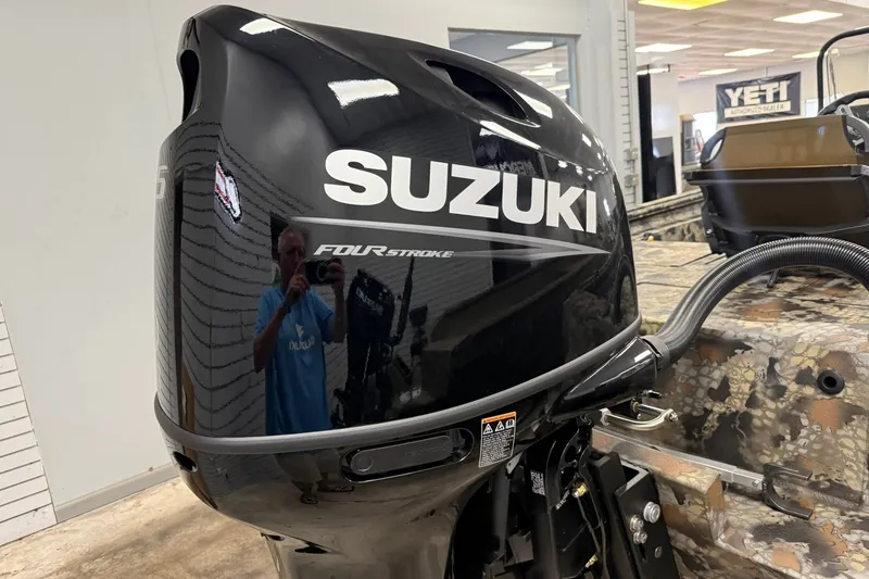 Slide: The Image of Black Suzuki four-stroke outboard motor on Thor BH1900CC boat, 2027 model. - 4