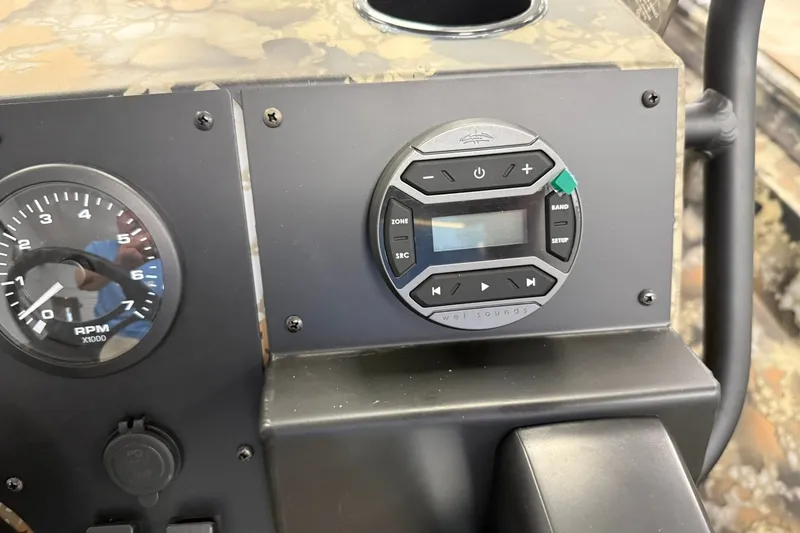 Slide: The Image of Dashboard of 2027 Thor BH1900CC with RPM gauge and audio controls. - 8