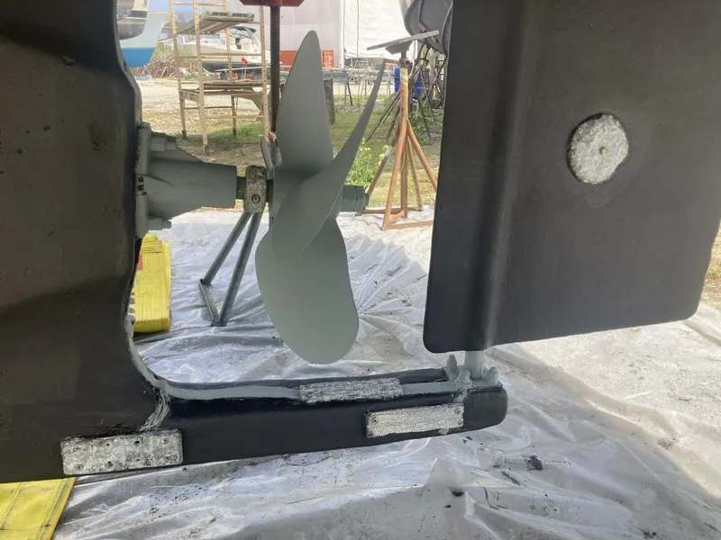 Slide: The Image of Close-up of a boat rudder and propeller in a shipyard. - 40