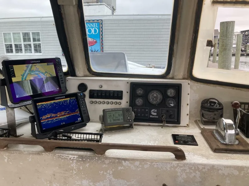 Slide: The Image of The cockpit of a 1986 BHM 32 with navigation equipment and control instruments. - 30