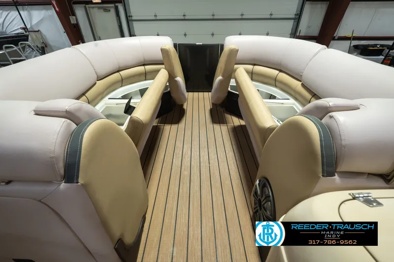 Slide: The Image of Luxurious interior of 2017 South Bay 725 RS pontoon boat with plush seating. - 26