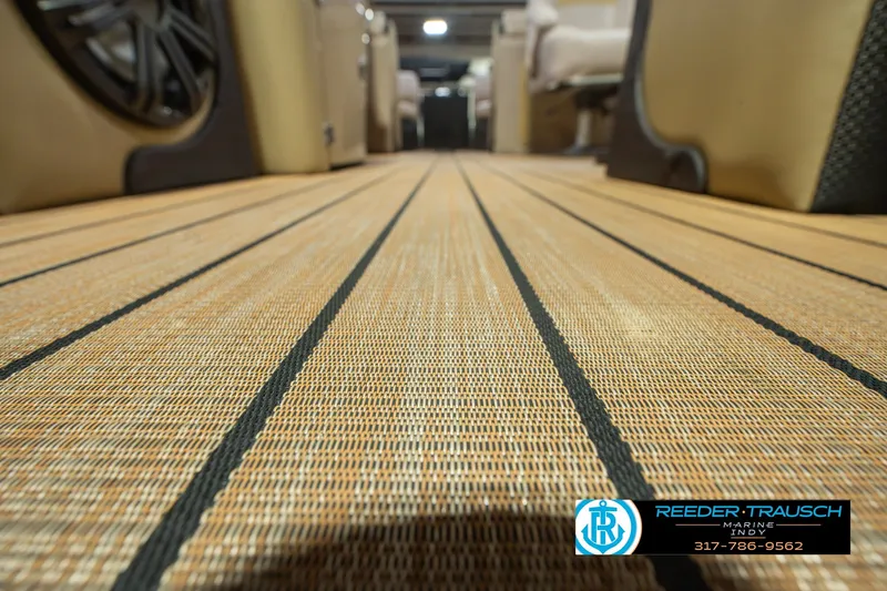 Slide: The Image of Interior view of 2017 South Bay 725 RS boat with textured flooring. - 50