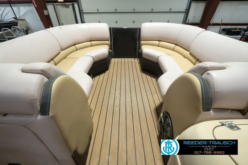 Slide: The Image of Luxurious interior of 2017 South Bay 725 RS pontoon boat with plush seating. - 25