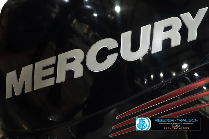 Slide: The Image of Close-up of Mercury engine logo on a 2017 South Bay 725 RS boat. - 52
