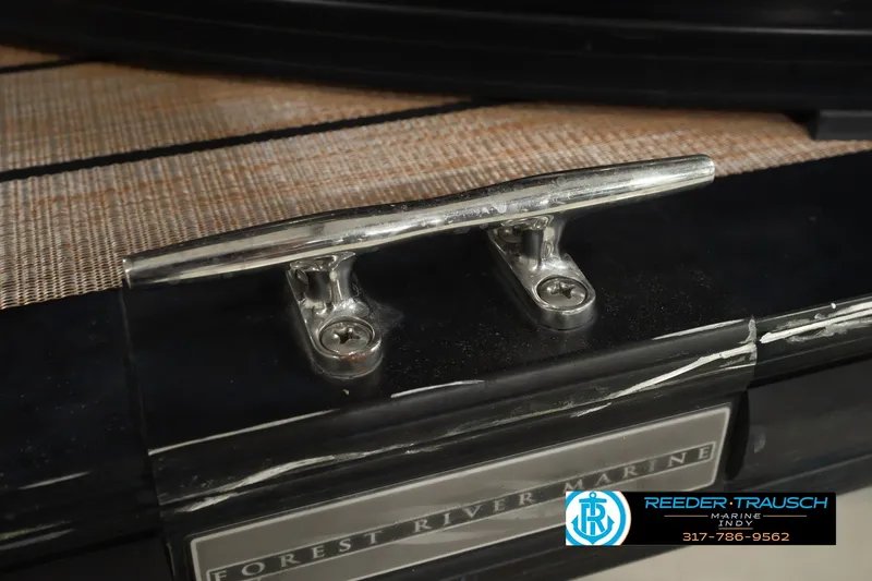 Slide: The Image of Chrome cleat on 2017 South Bay 725 RS boat deck, with branding visible. - 59