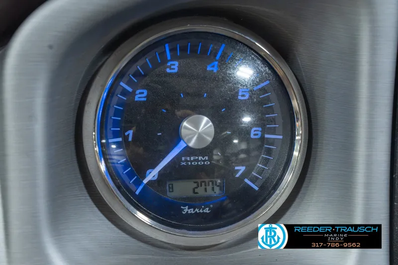 Slide: The Image of Close-up of a 2017 South Bay 725 RS tachometer displaying RPM and hours. - 39