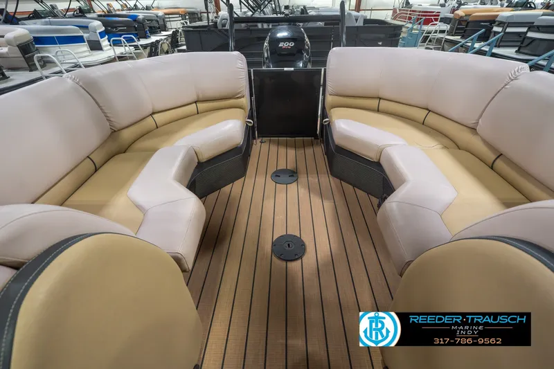 Slide: The Image of 2017 South Bay 725 RS pontoon boat interior with plush seating and wood-style flooring. - 33