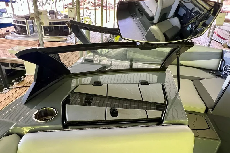 Slide: The Image of 2023 Axis A225 boat interior with sleek seating and modern design elements. - 20