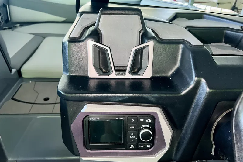Slide: The Image of 2023 Axis A225 dashboard with Bluetooth-enabled control panel and sleek design. - 17