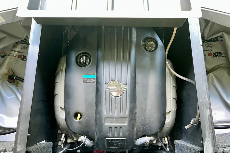 Slide: The Image of 2023 Axis A225 engine compartment showcasing Monsoon engine components. - 34