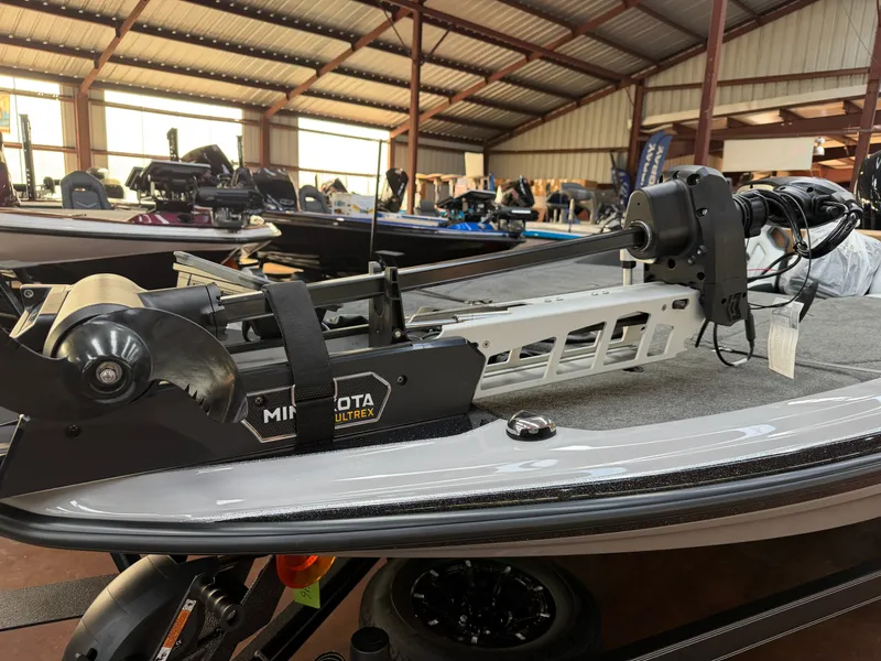 Slide: The Image of A 2027 Skeeter ZXE20 is in a warehouse. A Minn Kota Ultrex motor is mounted. - 7