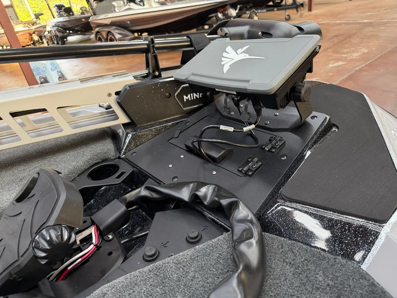 Slide: The Image of Close-up of the control area on a Skeeter ZXE20 boat with electronic equipment. - 6