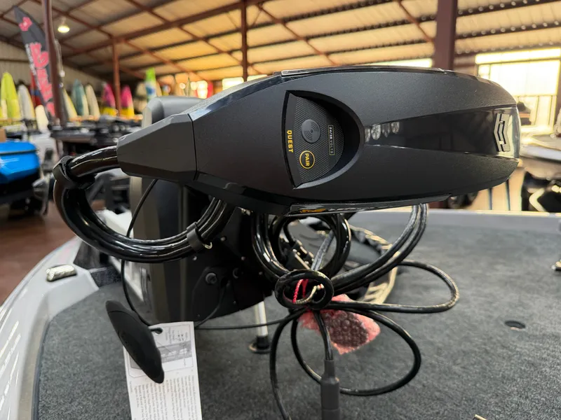 Slide: The Image of Close-up of a control unit on a 2027 Skeeter ZXE20 boat in a warehouse setting. - 8