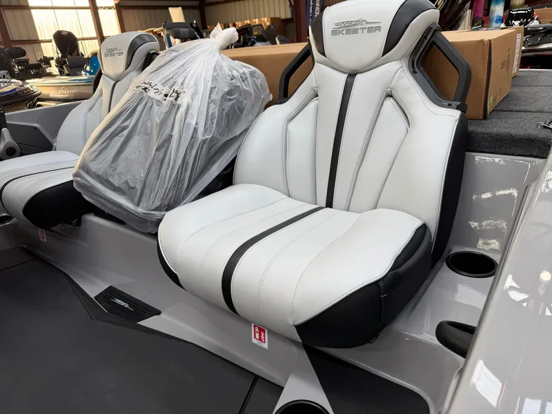 Slide: The Image of The 2027 Skeeter ZXE20 features modern seats with white and black accents, showcasing sleek design. - 10
