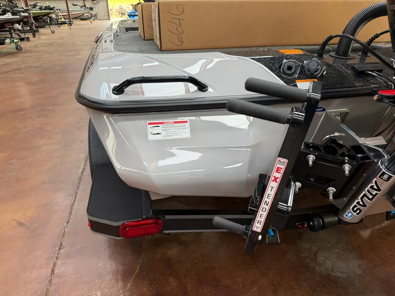 Slide: The Image of The image shows the rear of a 2027 Skeeter ZXE20 boat on a trailer. - 20