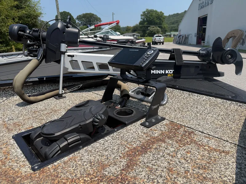 Slide: The Image of 2015 Tracker Pro Team 175 TXW with Minn Kota trolling motor and controls on the deck. - 9