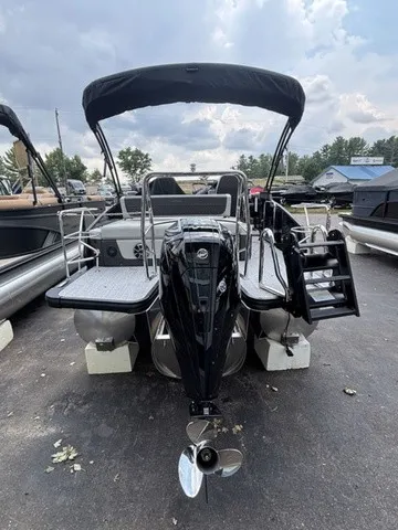 Slide: The Image of The image shows a 2027 Harris SUNLINER 230 SLDH pontoon boat with an outboard motor. - 5