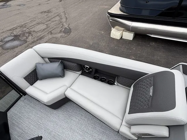Slide: The Image of The image shows a luxurious seating area on a Harris SUNLINER 230 SLDH pontoon boat. - 8