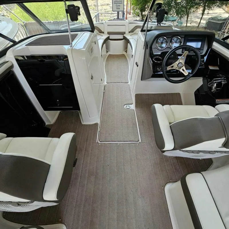 Slide: The Image of Interior of a 2016 Yamaha 242 Limited S E-Series with sleek seating and modern cockpit. - 8