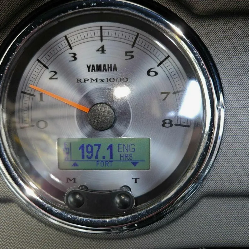 Slide: The Image of Close-up of a Yamaha tachometer showing 197.1 engine hours. - 19