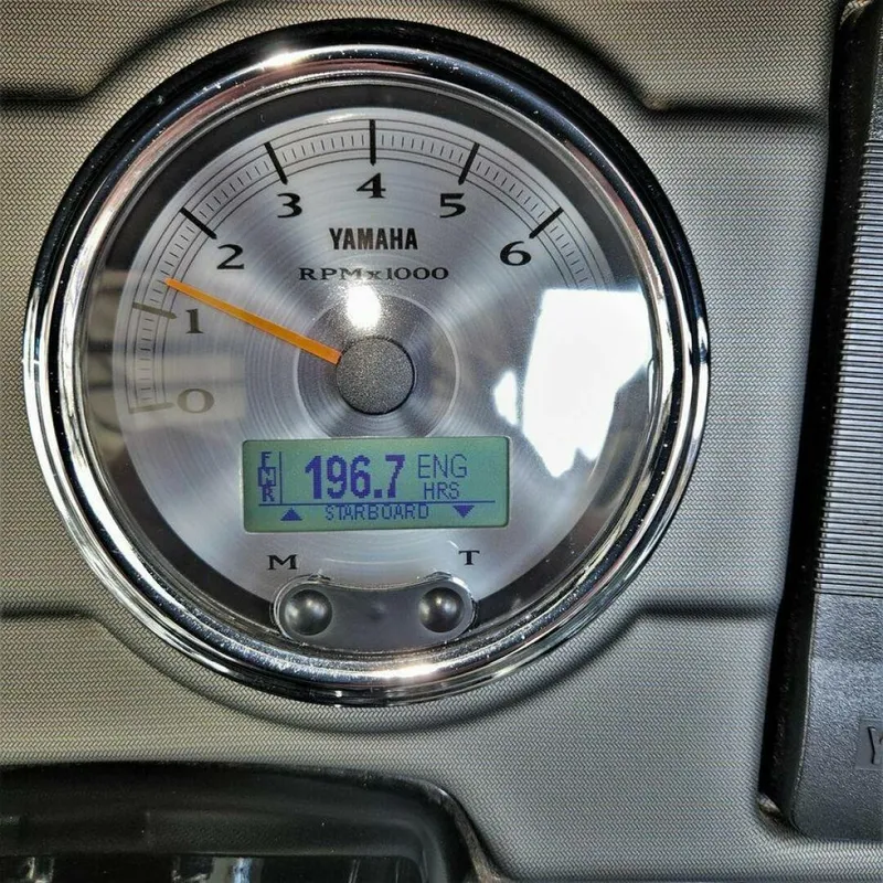 Slide: The Image of A Yamaha Boats tachometer displays 196.7 engine hours. - 20