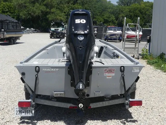 Slide: The Image of Rear view of a Tracker Bass Tracker Classic CC boat with a Mercury 50 outboard motor. - 5