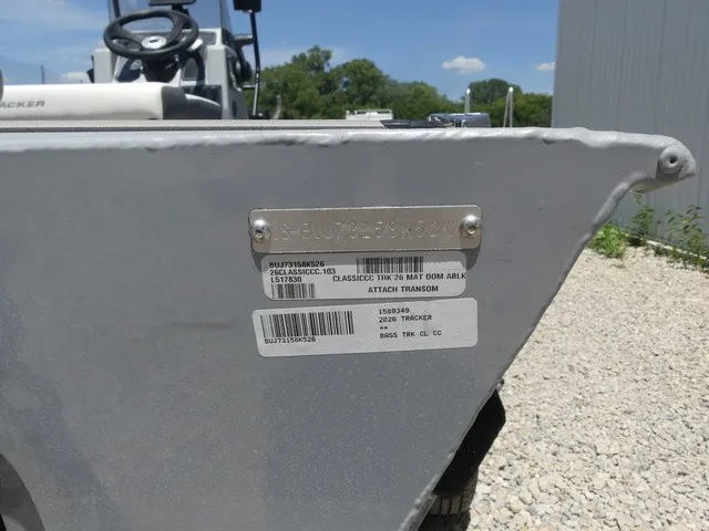 Slide: The Image of Close-up of a Tracker boat's stern with serial numbers visible. - 24
